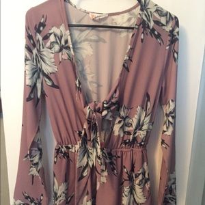 Blush, floral romper with front tie.